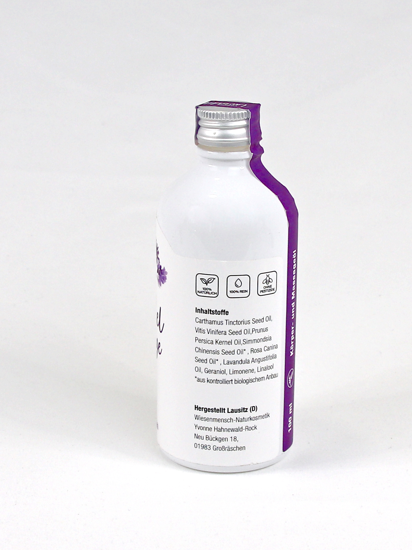 100 ml Flasche Massageöl von links